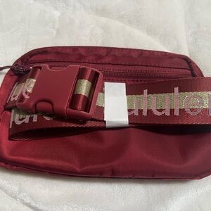 lululemon athletica Maroon Nylon Pouch with Gold Zipper